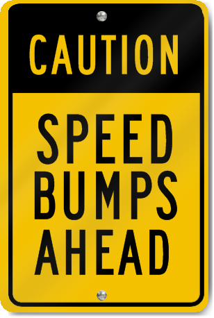 Caution Speed Bumps Ahead Sign