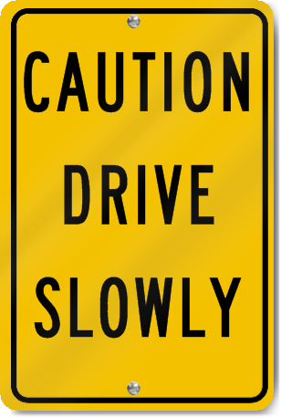 Caution Drive Slowly Sign