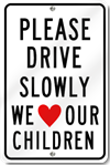 Please Drive Slowly We Love Our Children Sign